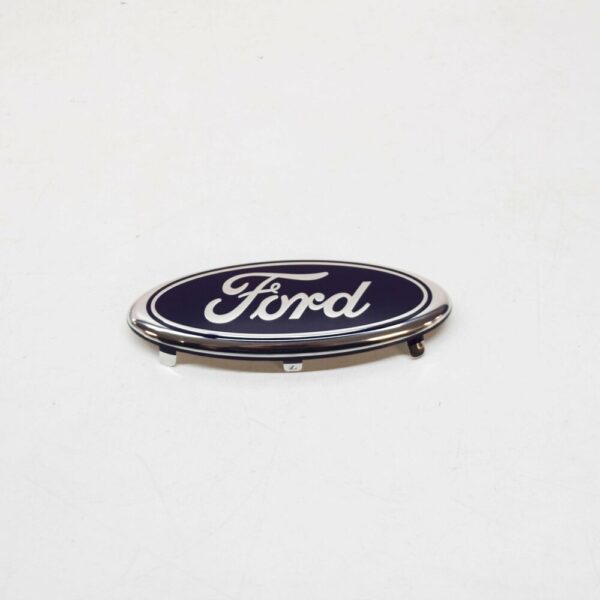 1207555 - NEW FORD FIESTA WS MK5 FRONT RADIATOR GRILLE BADGE 1207555 ORIGINAL