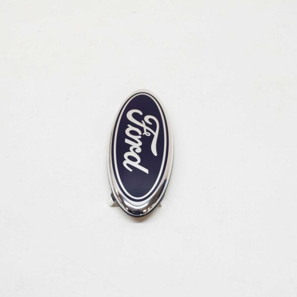 1207555 - NEW FORD FIESTA WS MK5 FRONT RADIATOR GRILLE BADGE 1207555 ORIGINAL