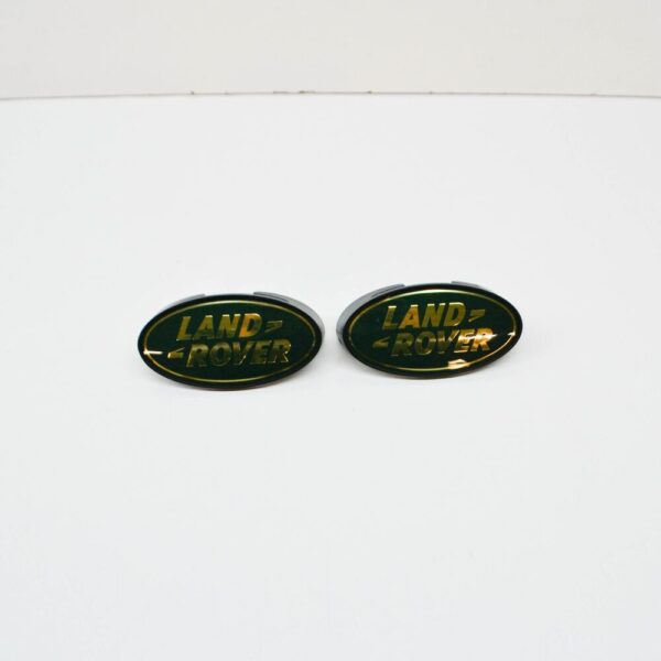 DAS100150 - LAND ROVER DEFENDER Pick-up 110 Front Grill Emblem DAS100150 NEW Original
