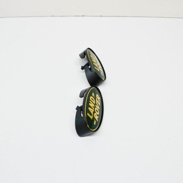 DAS100150 - LAND ROVER DEFENDER Pick-up 110 Front Grill Emblem DAS100150 NEW Original