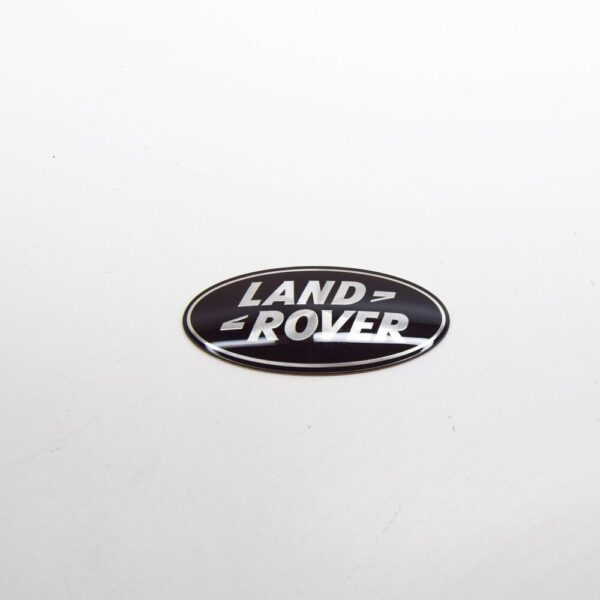 LR044544 - LAND ROVER RANGE ROVER EVOQUE L538 Front Grille Emblem LR044544 NEW GENUINE
