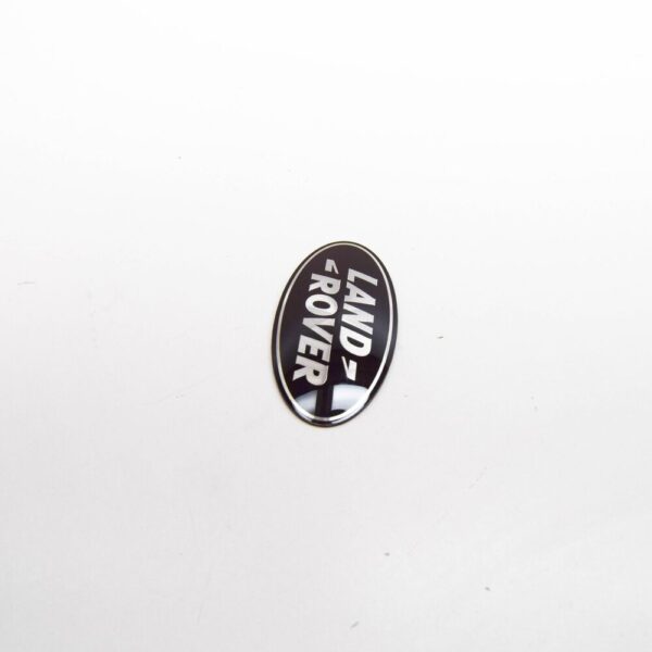 LR044544 - LAND ROVER RANGE ROVER EVOQUE L538 Front Grille Emblem LR044544 NEW GENUINE
