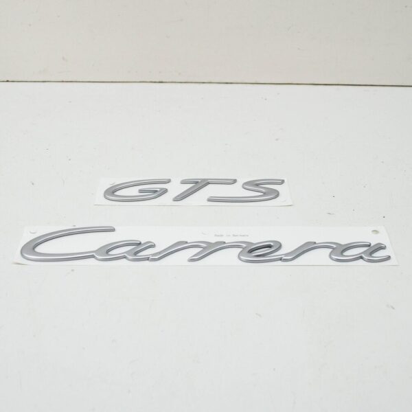 99755903706 - Porsche 911 997 Carrera GTS tailgate emblem 99755903706 NEW ORIGINAL