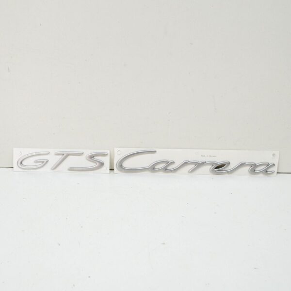 99755903706 - Porsche 911 997 Carrera GTS tailgate emblem 99755903706 NEW ORIGINAL
