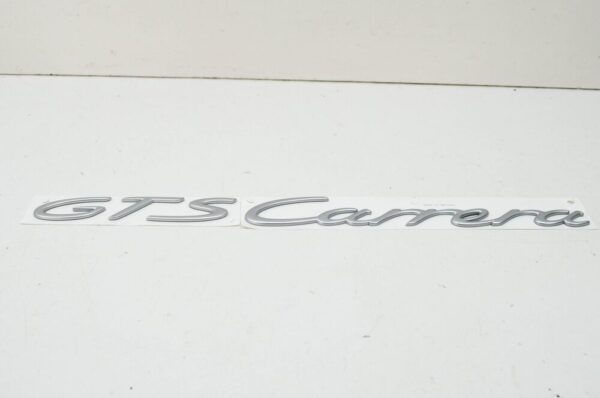 99755903706 - Porsche 911 997 Carrera GTS tailgate emblem 99755903706 NEW ORIGINAL
