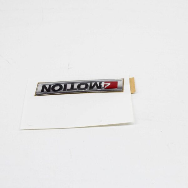 7E0853675MMGM - NEW VW AMAROK REAR 4 MOTION EMBLEM SHIELDS 7E0853675MMGM ORIGINAL