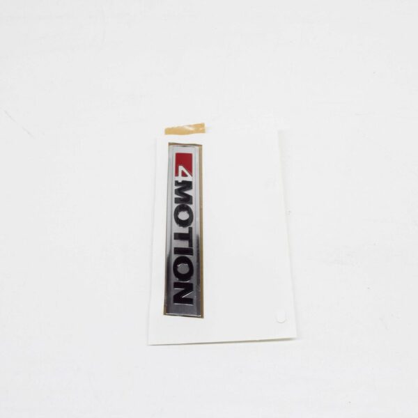 7E0853675MMGM - NEW VW AMAROK REAR 4 MOTION EMBLEM SHIELDS 7E0853675MMGM ORIGINAL