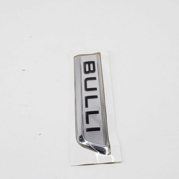 7E0853688ACBX - NEW VW TRANSPORTER T6 FRONT LEFT DOOR BADGE SELF-ADHESIVE 7E0853688ACBX ORIGINAL