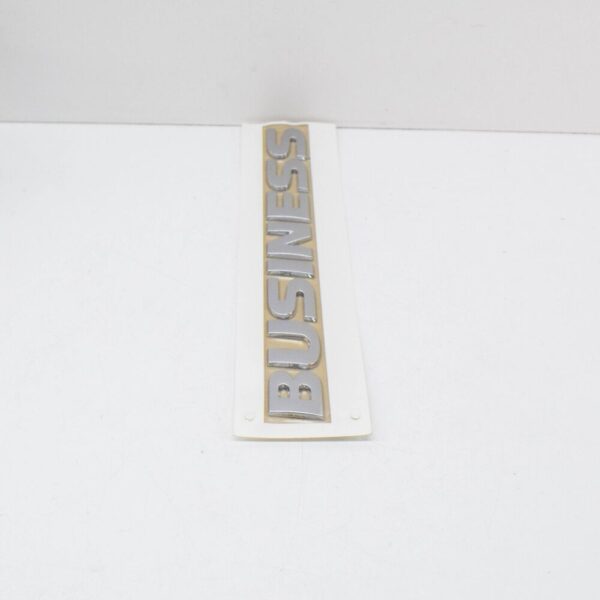 7E5853687A739 - VW Transporter T5 Rear Tailgate Boot Lid Emblem Badge 7E5853687A739 NEW GENUINE