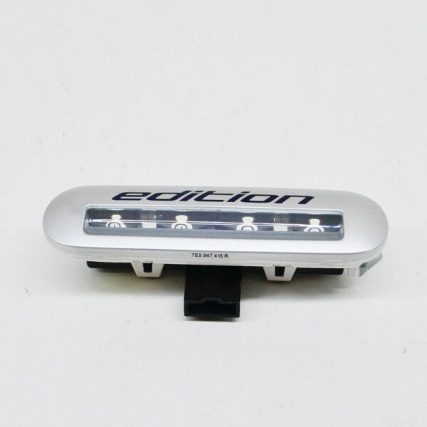 7E5947415R - VW TRANSPORTER T5 Entry Lighting 'Edition' Lettering 7E5947415R72A NEW GENUINE