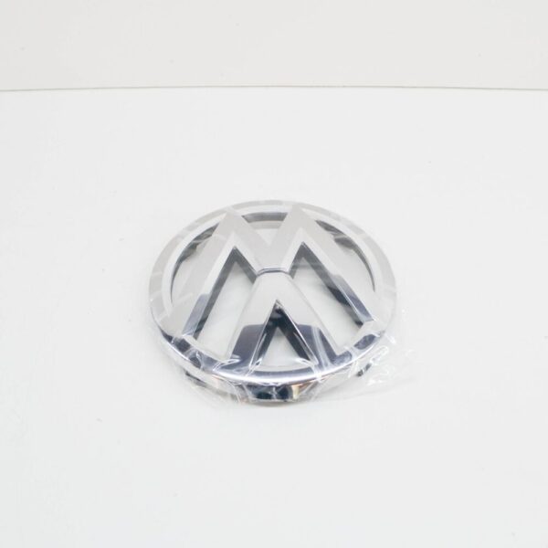 7P6853601AULM - NEW VW TOUAREG 7P FRONT RADIATOR GRILLE EMBLEM 7P6853601AULM OEM